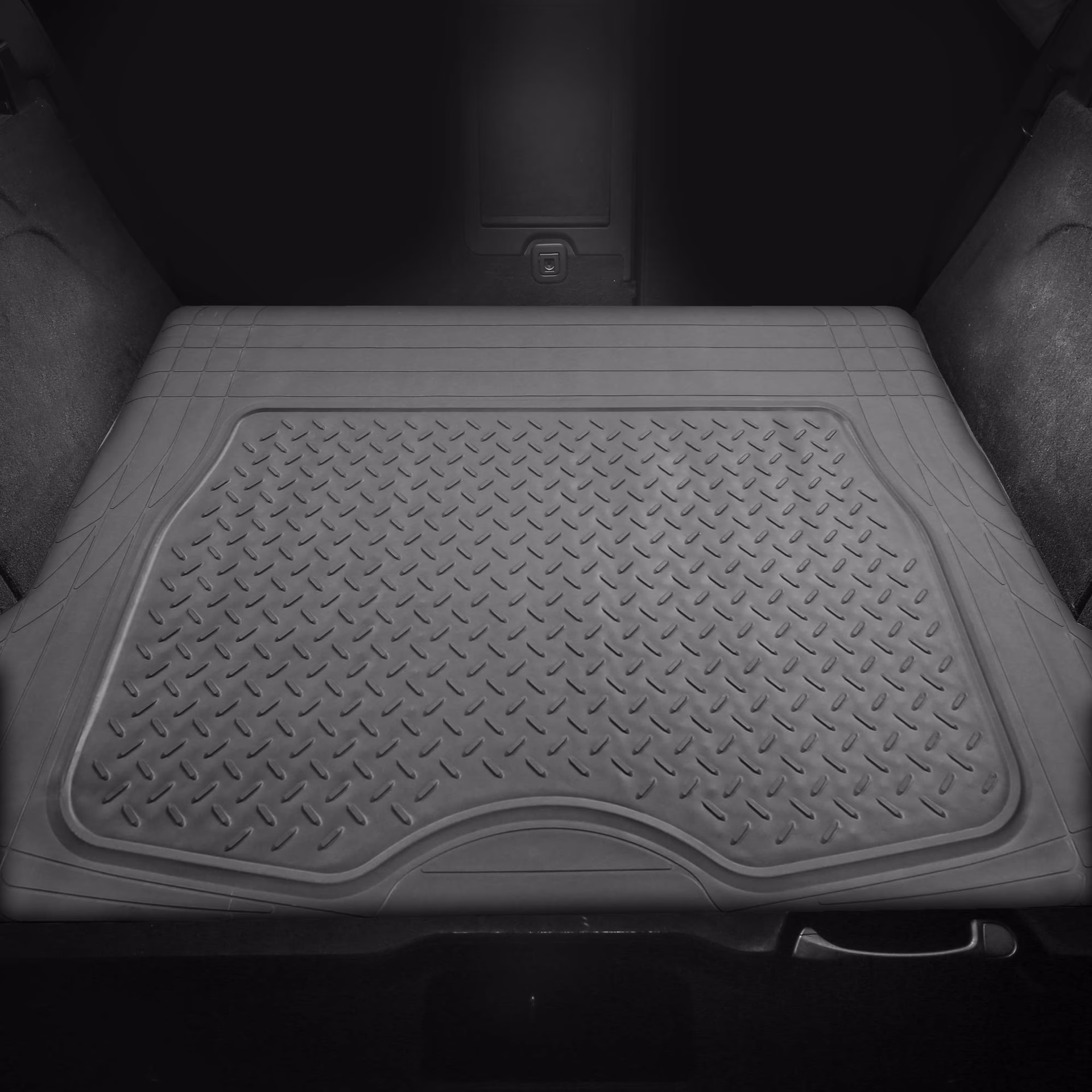¿Cómo se llama la alfombra del cofre de un carro?