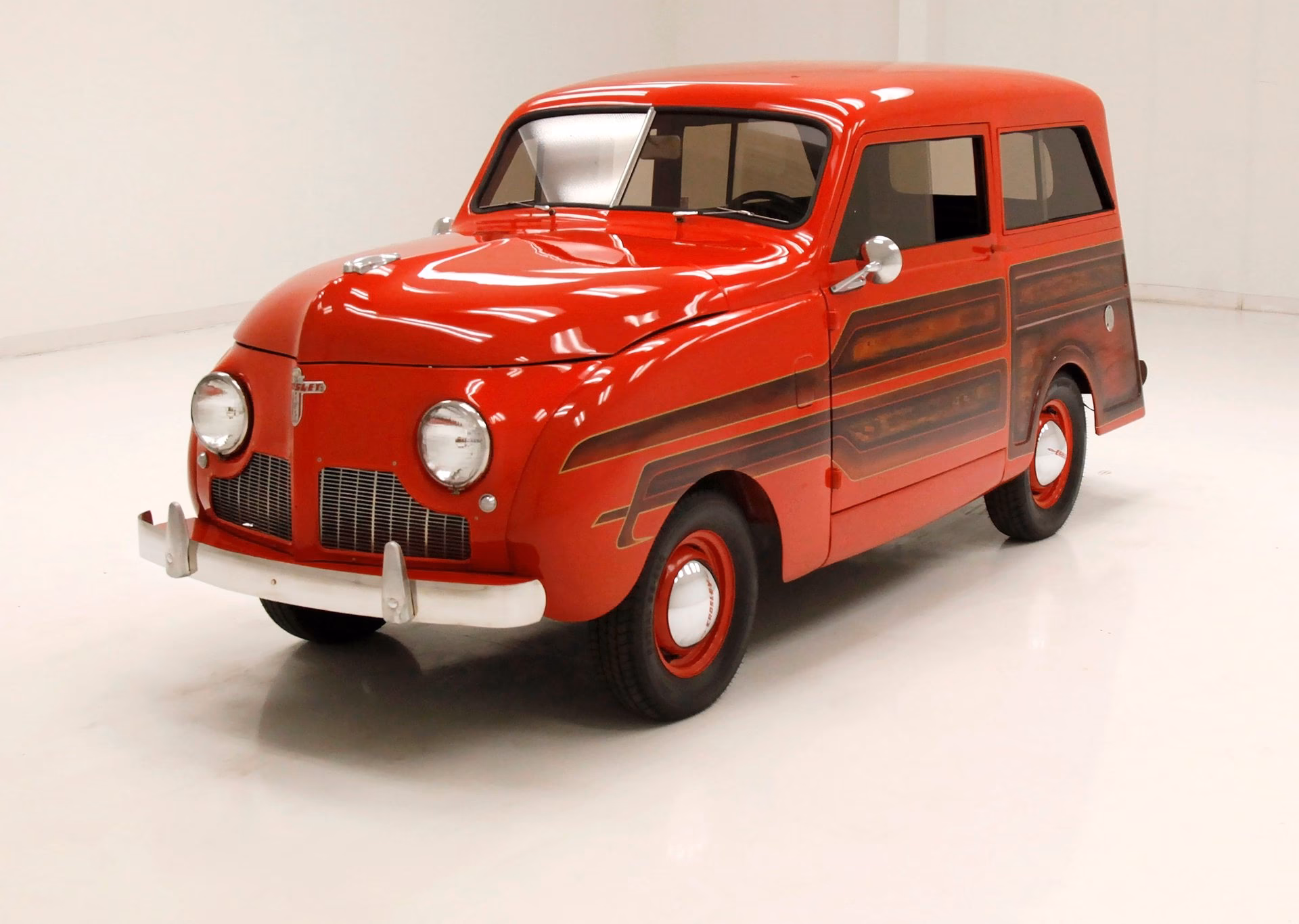 Who invented the auto wagon?