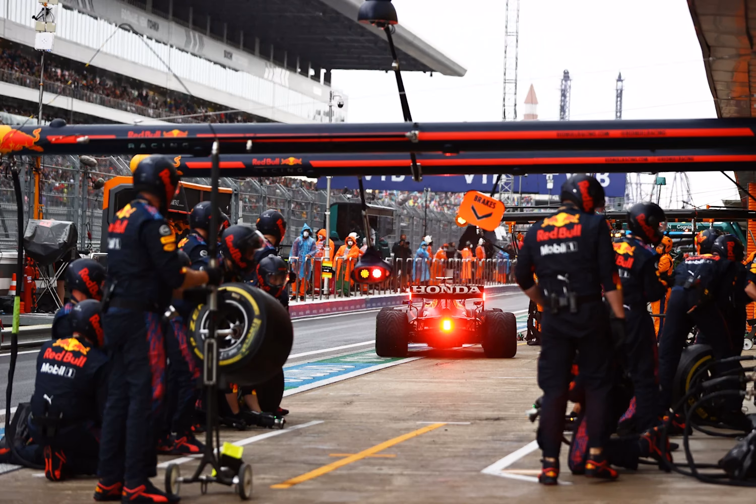 What happens when a car stops and takes a full pit stop?
