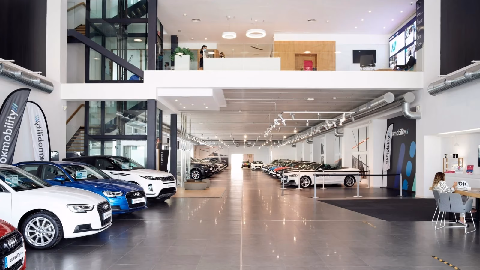 Who owns OK Mobility car rental?